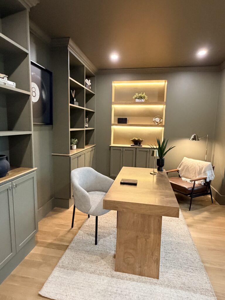 Green well lit office room with built in shelving at 72 valley rd Needham