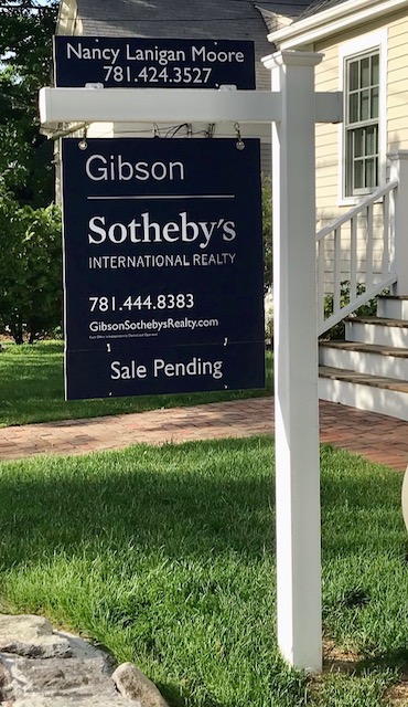 Gibson Sotheby’s International Realty yard sign for Nancy Lanigan Moore displaying “Sale Pending” outside a home in Needham, MA.